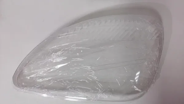 Скло фари ГАЗ 3302, 2217 нового зразку ліве пластик 1305.630.136 (аналог 2171.1305630136)  (вир-во Формула Света)